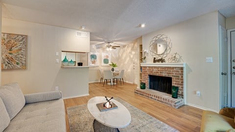 Living Room With Fireplace at Indian Creek Apartments, Texas, 75007